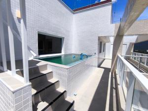 Apto Cobertura com Piscina 08 pessoas 03 dormitórios Bertioga SP Frente Mar