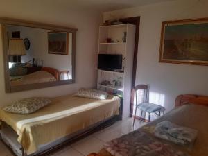 Camere con patio e giardino vicino lago