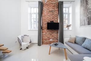 Łódź Downtown Apartment with Mezzanine by BookingHost