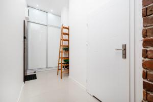 Łódź Downtown Apartment with Mezzanine by BookingHost