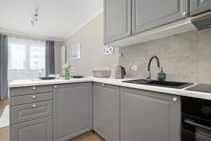 Elegant and Bright Apartment in Rzeszów with Balcony by Noclegi Renters