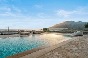 Serene Villas, by Estia