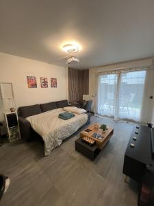 Appartement moderne avec jardin privatif