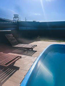 Casa refúgio 10 minutos de Canasvieiras com piscina e churrasqueira