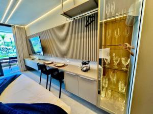 Lindo flat em Muro Alto Térreo com varanda gourmet