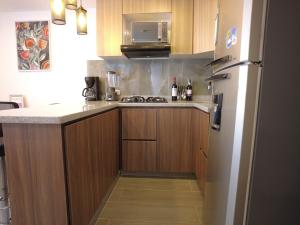 Apartamento dos dormitorios cerca del terminal terrestre y del aeropuerto