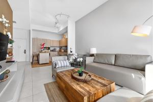 Wake Up to the Sound of Waves in a Stylish Condo in a Luxury Resort