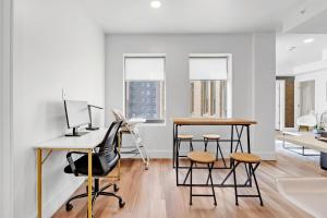 Downtown Tulsa 2BR Escape with Gym Rooftop Lounge & Pet-Friendly Stay