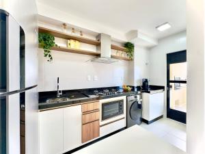 Apto com vista p o mar e pertinho do Beto Carrero