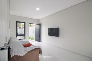 Casa c Churrasqueira e Jacuzzi ADR0002