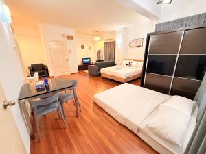 CozyHome Suites Casa Mutiara