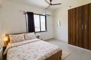 New Spacious 2BHK apartments in Tirupati Near Railway Station with fully equipped kitchen, AC bedrooms, Washing Machine, 24 hours water, caretaker service, and ample space for car parking & ideal for families and pilgrims