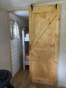 Chalet Inn de Natuur met Veranda bij Brunssummerheide!