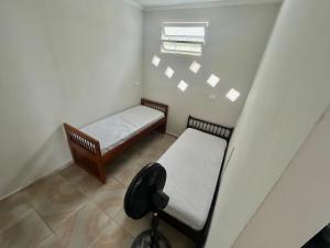 Casa simples em Caraguatatuba, Ambiente Tranquilo e Acolhedor próximo a praia