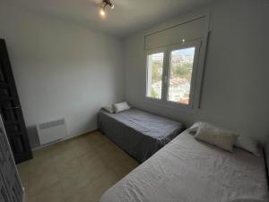 Apartamento acogedor en Roses, 2 habitaciones, aire acondicionado, internet, aparcamiento - ES-319-43