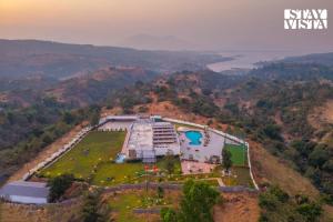 StayVista at Saya Infinity with Pool, Lawn