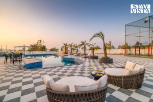 StayVista at Saya Infinity with Pool, Lawn