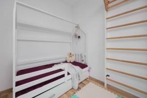 Family Apartment with Air Conditioning and Childrens Room by Noclegi Renters