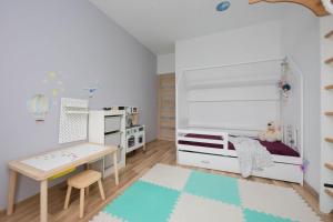 Family Apartment with Air Conditioning and Childrens Room by Noclegi Renters