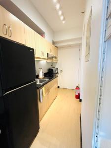 Free Car Parking - Sheridan North 1BR Apt near BGC