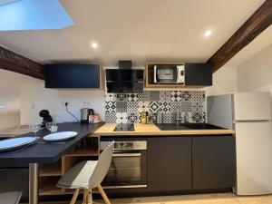 Cocon Mansardé - Velux et Clim - Hyper Centre