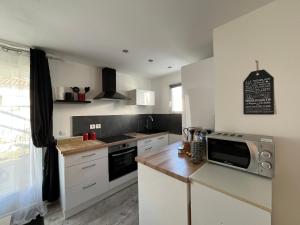 Le numéro 4 Joli appartement avec jardin clos