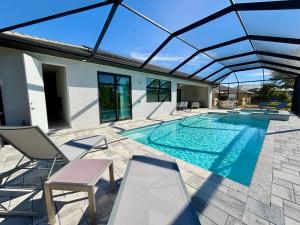 CoralVilla Bright Side - am Wasser, Pool, Bootsdock