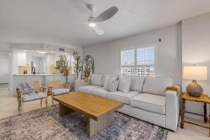 Updated direct oceanfront corner 22 with stunning beach views, a heated pool, and parking garage