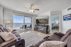Direct oceanfront 22 condo with large private balcony, heated pool, and garage parking