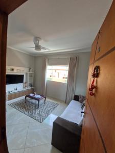 Apto com 3 quartos,1 vaga garagem e quintal