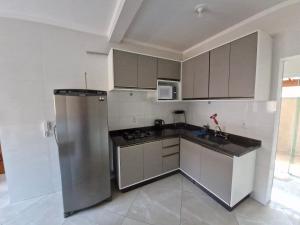 Apto com 3 quartos,1 vaga garagem e quintal