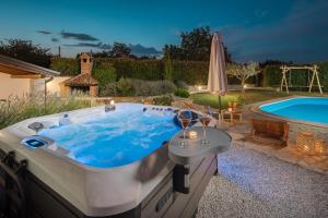 Villa Nonni in Central Istria for 4 persons with 32 m2 private pool, jacuzzi, free bikes & kids playground