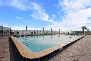 Outrigger Beach Club Resort by CoolVacay