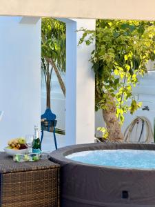 Modern 2BR Villa with Heated Hot Tub and Steps to Beach
