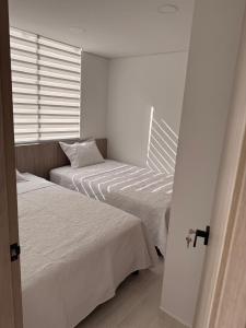 Apartamento en conjunto Melgar con piscina