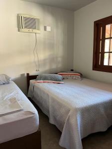 Residencial Casa Laranja - Casas na Praia da Ferrugem