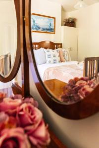 Dukes on Quayle Whimsical Sandy Bay Cottage Stay