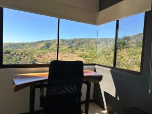 Casa mirando a la montaña, camino al volcán