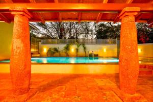 ELIVAAS Signature Terra Rosa Portuguese-styled 4-BHK Villa With Private Pool, Garden, Veranda & Sit-out Area