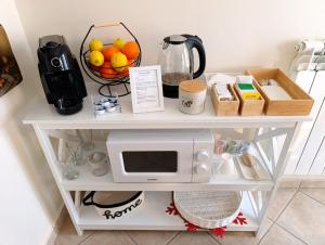 Domus REA - Appartamento moderno con check-in automatico H24 e area esterna privata