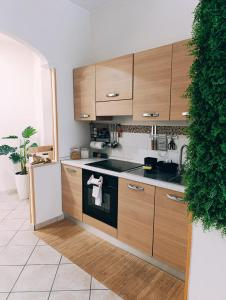 Domus REA - Appartamento moderno con check-in automatico H24 e area esterna privata