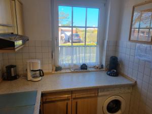 Ferienhaus Schirmqualle