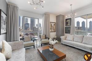 Vogue Vacation Homes, Downtown Burj Residence Near Dubai Mall and Burj Khalifa, Three Bedroom Plus Maids room Apartment with Balcony and City View, Access toAmenities
