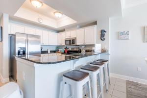 Crystal Shores West 1006 by Youngs Suncoast