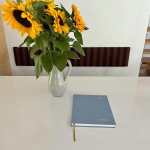 Be Surrounded By Trees In A Thatched Cottage