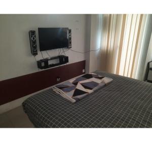 Hotel O Apartemen Grand Sentraland by Mira