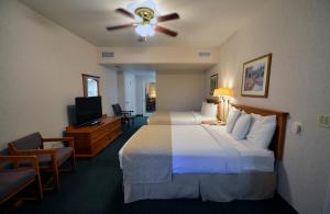 Queen Room with Two Queen Beds room in Garden Inn and Suites Fresno