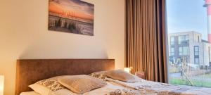 BeltBlick 26- Fehmarn – Exklusive Ferienwohnungen mit Meerblick und Garten