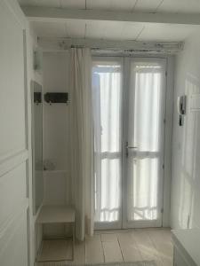 Bright frescoed attic in the city center, Brescia