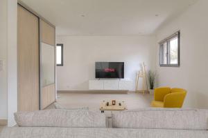 Maison Chaleureuse avec jardin